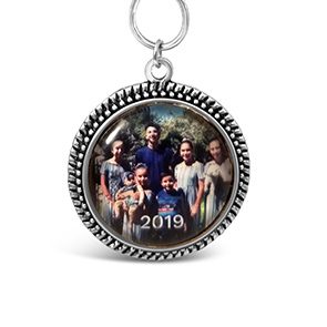 a family photo hanging from a key chain