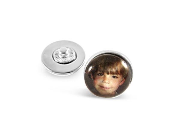 a button with a child's face on it