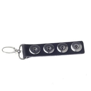 a key chain with three metal buttons on it