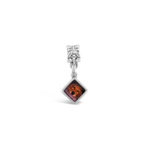 an orange and black square charm on a white background