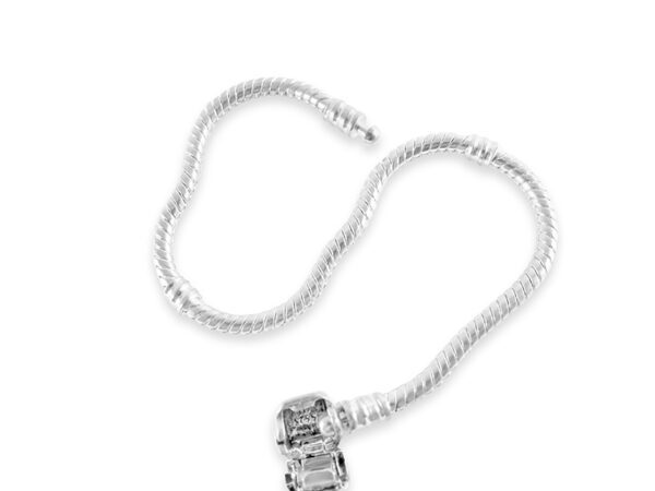 a white necklace with a silver clasp