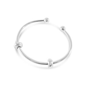 a silver bracelet with two balls on it